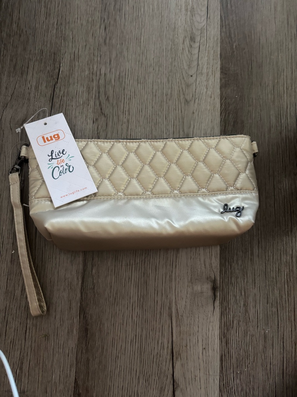 lug Quilted Satin Wristlet Clutch in Champagne